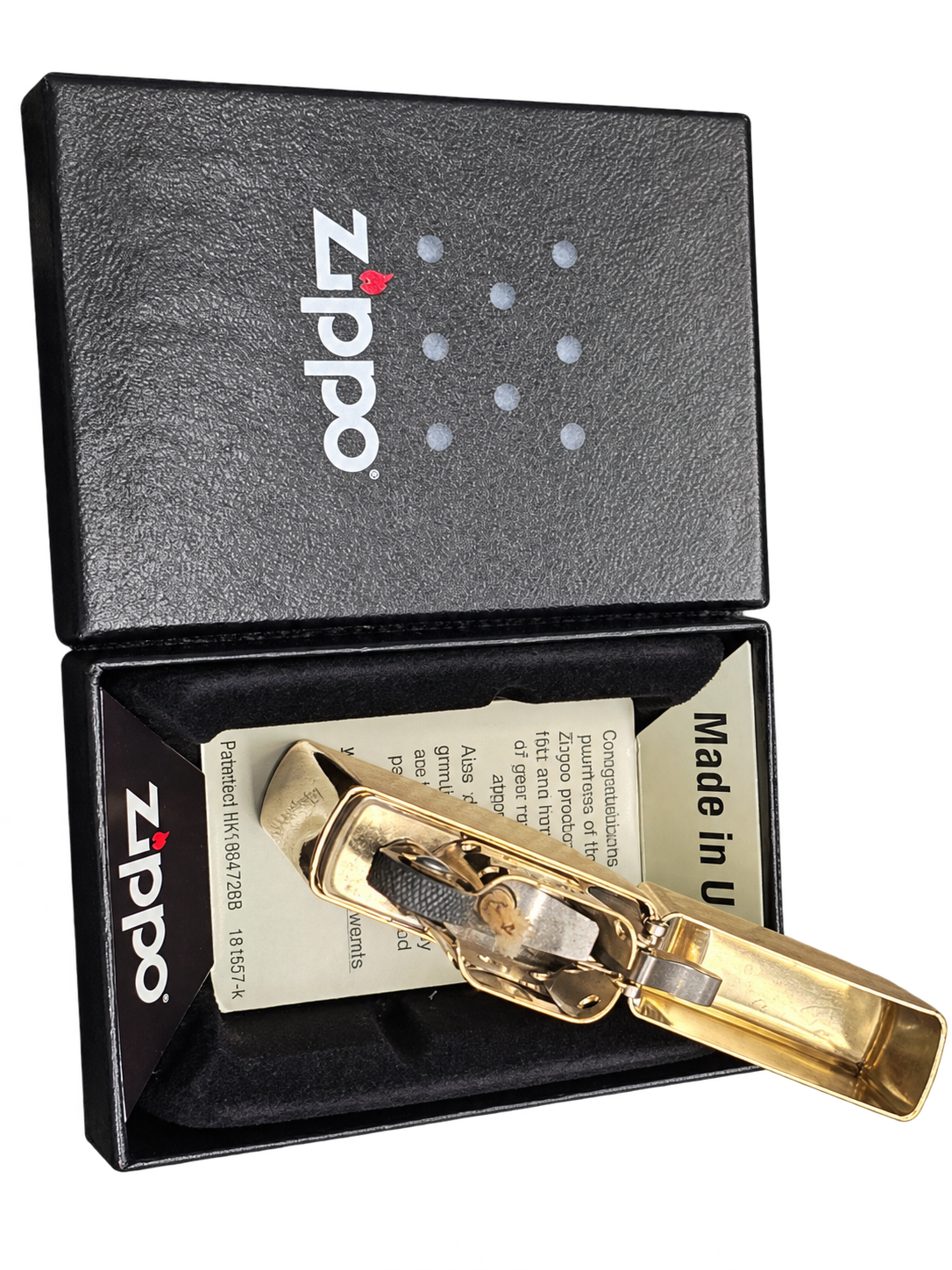 Generic Brass Flip-Top Petrol Lighter - Supplied photograph of an open lighter in its presentation box. Branded items require individual assessment; no affiliation is implied.