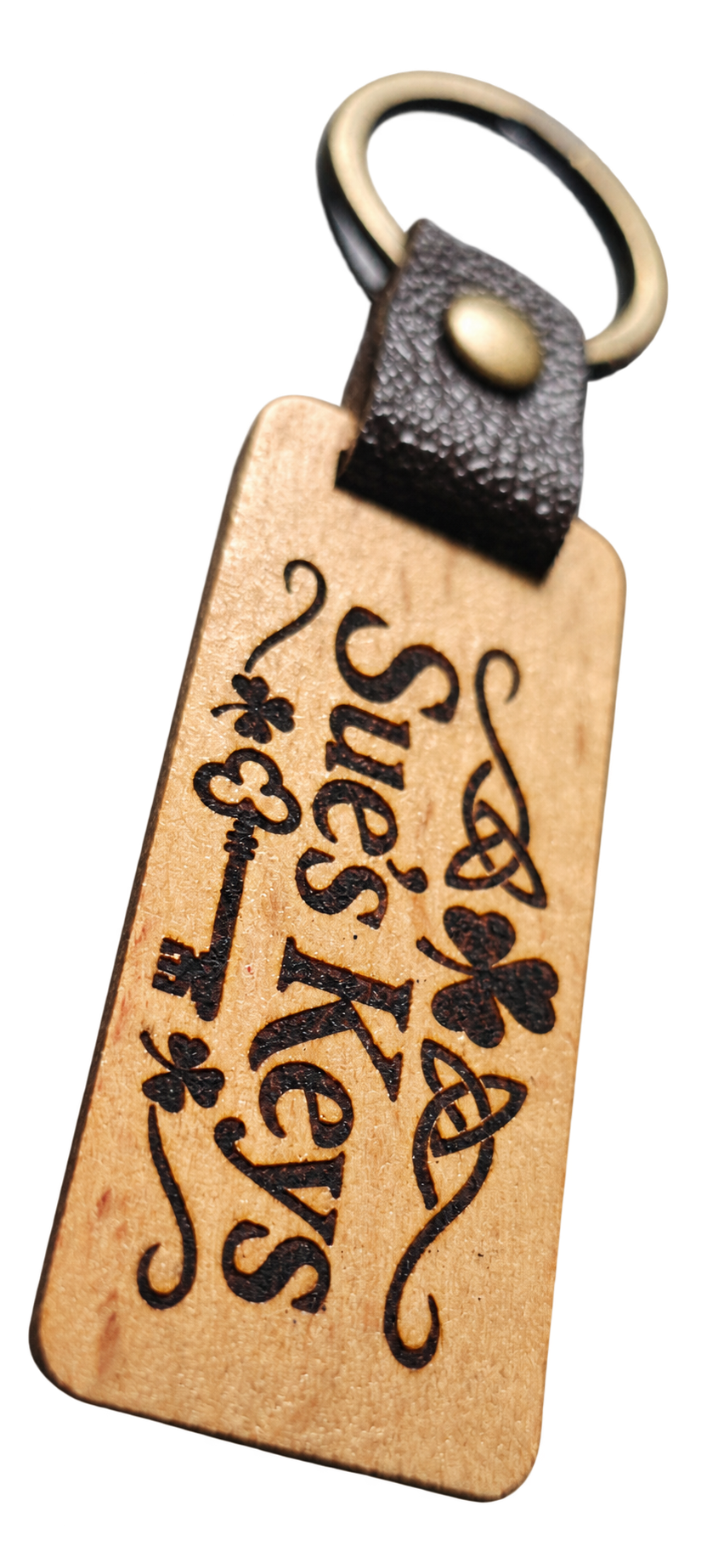 Sue's Keys Wooden Keyring - Laser-engraved wooden keyring with decorative motifs.